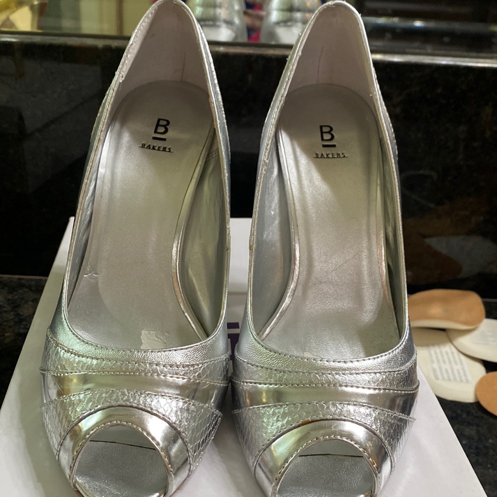 Size 7 1/2 silver high heels
